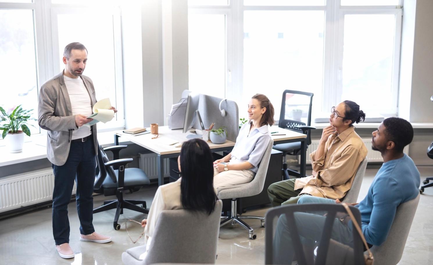 Team collaboration session with students discussing machine learning project strategies